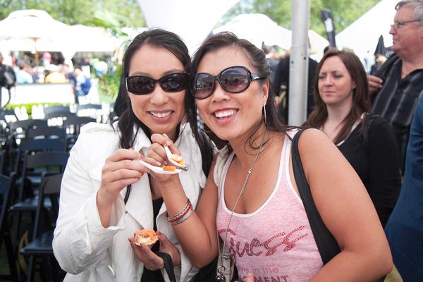 Punters enjoy canapes after watching the 'Art of Entertaining' demonstrations at the Regal Salmon Star Marquee